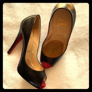 Christian Louboutin Prive peep toe heels.